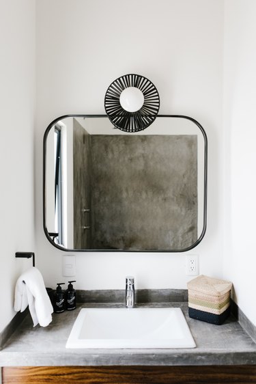 Modern bathroom sink and mirror.