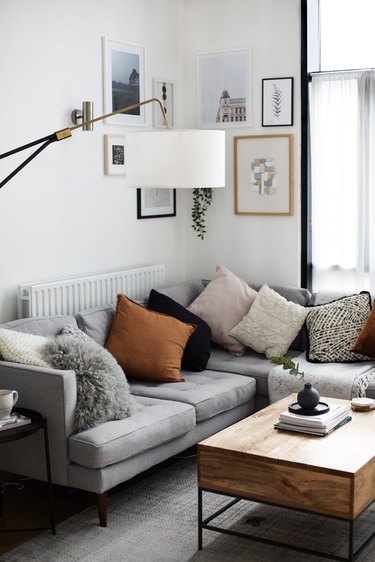 cozy living room corner idea with sofa and artwork