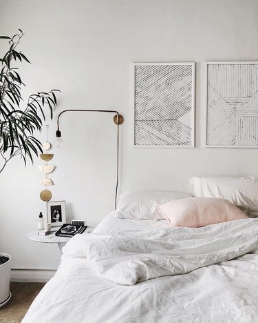 white bedroom ideas with modern artwork