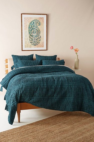 bohemian teal bedroom idea with duvet and pillows