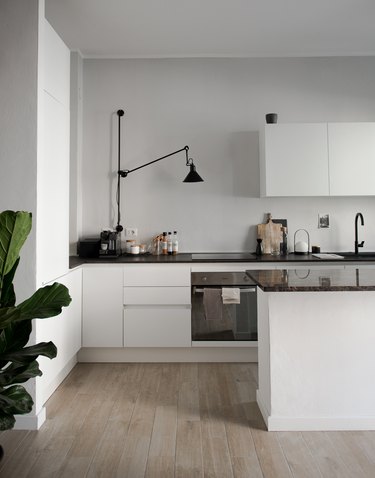 minimalist apartment ideas with gray kitchen and black fixtures