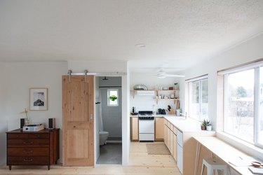 studio apartment with plywood kitchen