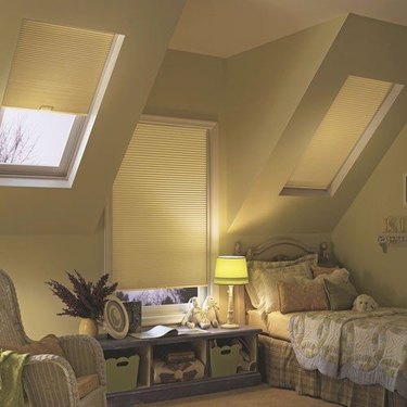 Upstairs bedroom with skylights.
