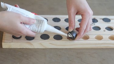 Gluing magnets into board