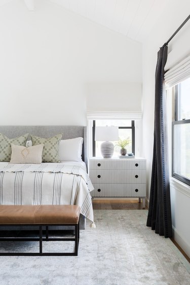 Traditional bedroom with patterned linens and pillows