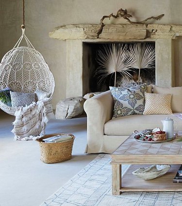 Boho chic dream catcher white weave fireplace with palms
