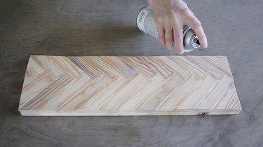 Spraying clear coat finish onto knife rack