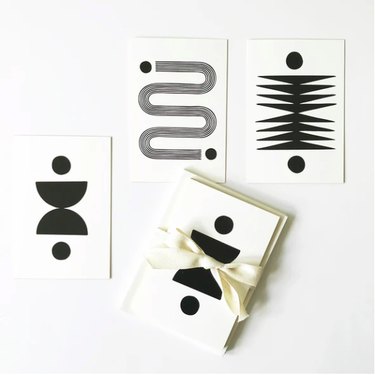 Black and white shapes printed on white cards