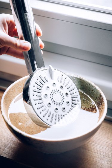 Cleaning removeable showerhead