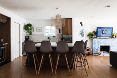 modern kitchen island with grey barstools