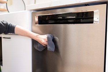 Hand cleaning stainless steel dishwasher