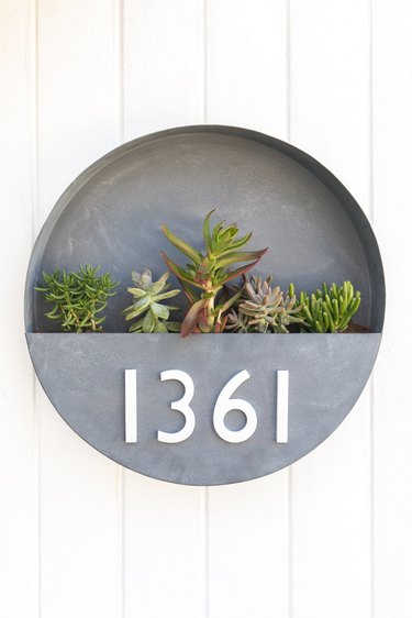round DIY house number sign with planter