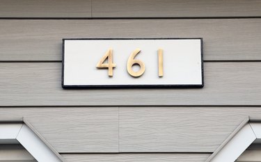 DIY house number sign with brass numbers