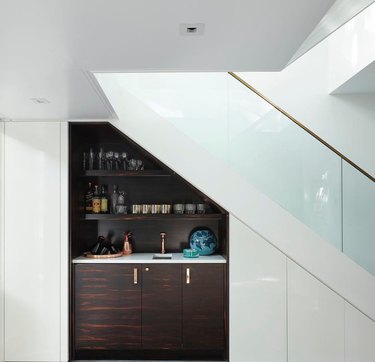 8 Clever Ways to Utilize That Awkward Space Under Your Stairs