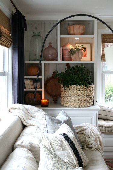 Living room storage ideas with built-in bookcase and cozy sofa