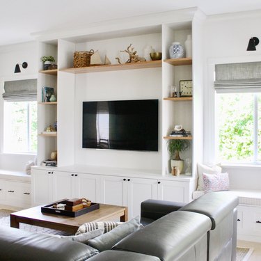 Built-in living room storage idea framing television