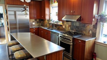 Kitchen with stainless steel countertops
