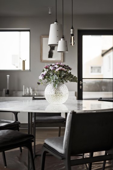 industrial style dining room of Buster + Punch founder Massimo Minale