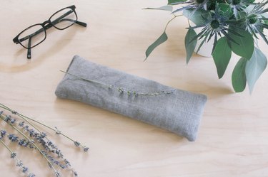 DIY lavender-fill eye pillow on bedside table.