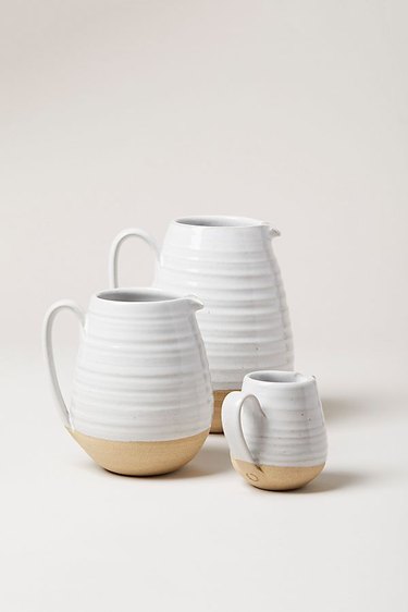 Three white pitchers farmhouse kitchen idea