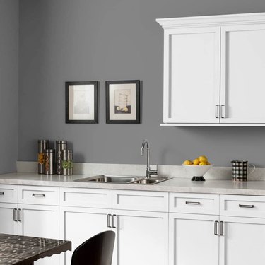 kitchen with white cabinets and gray walls
