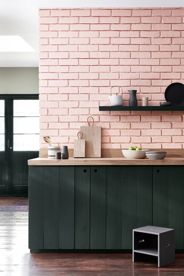 pink brick wall in kitchen