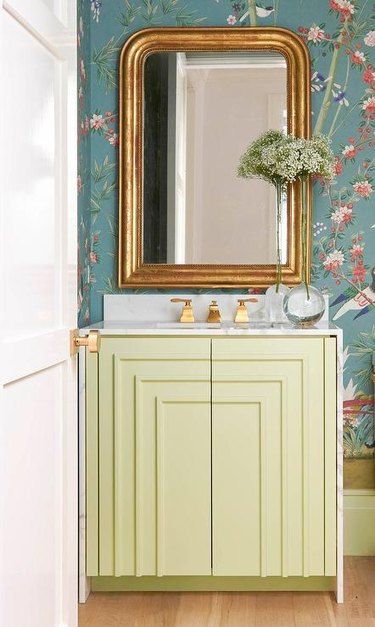 art deco decorating on a budget on a bathroom cabinet below a mirror