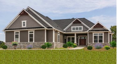 exterior of craftsman style ranch home with white trim