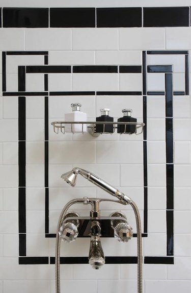 art deco decorating on a budget black and white shower tile with silver shower fixture