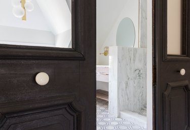 Good Bones: Restored Vintage Doors Lend Drama to a Majestic Master Bath
