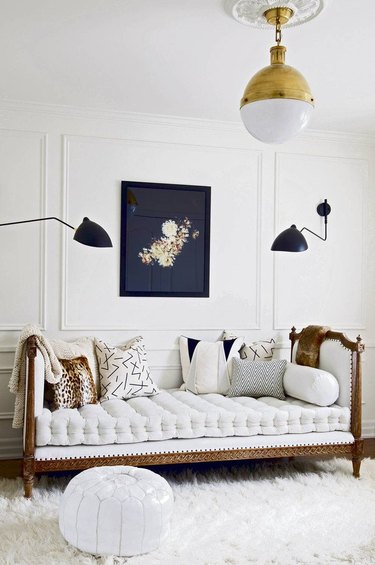 daybed in the living room idea with a white and wood daybed in a white room with a white shag rug