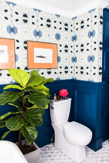 bathroom wainscoting idea with patterned wallpaper