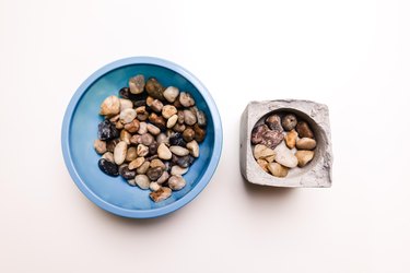 Layer of rocks at bottom of planter