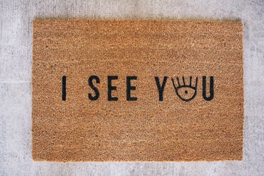 Finished doormat that says "I See You"