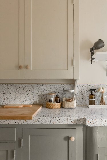 speckled contact paper for countertops with ivory and olive cabinets