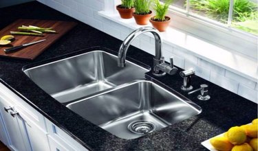 stainless steel sink in granite counter
