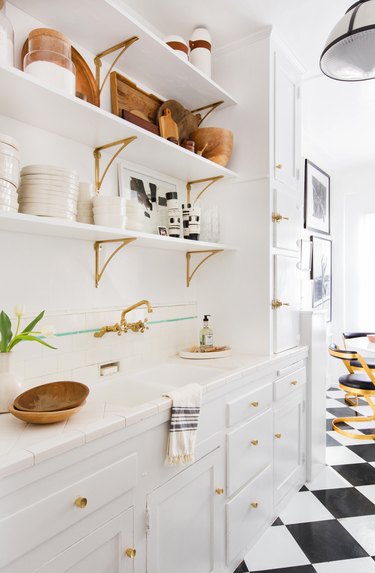 white kitchen backsplash idea with open shelving and white cabinets