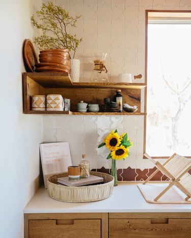 kitchen space with shelf and desert decor