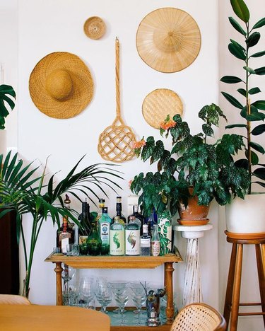 Mr. Cigar Loft bar cart with potted plants