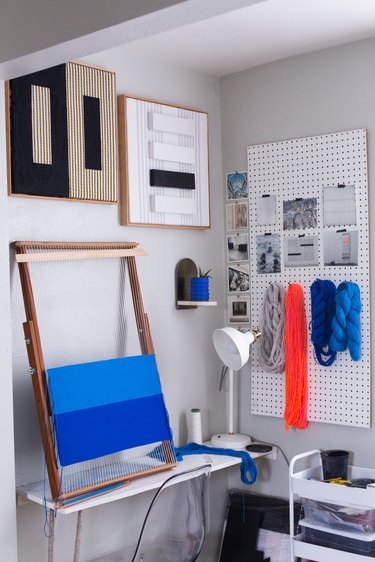 Weaving craft corner with pegboard basement wall ideas