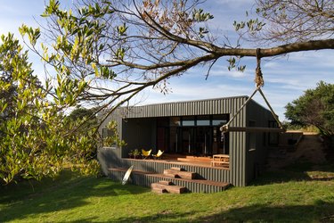 boxy house exterior near trees