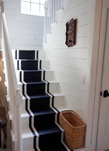 painted stairs with navy nautical stripes