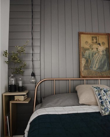 moody gray neutral colors in bedroom with shiplap and pendant light