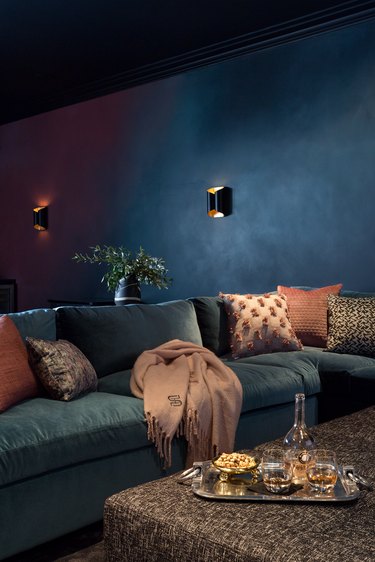 teal basement paint colors with teal sectional and wall sconces