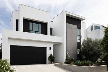 Premium AI Image  modern house with window and doormodern house with  window and doorclassic modern black and white hou