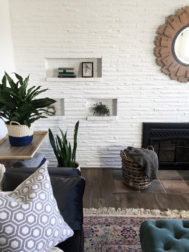 rustic basement ideas with white brick wall and indoor plants