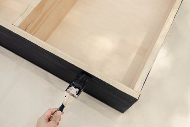 Painting side of wood cabinet black