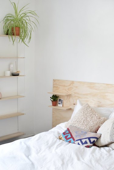shelves on headboard for DIY storage ideas for small bedrooms
