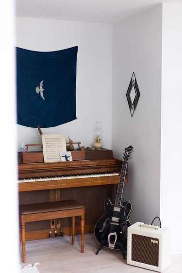 Vintage piano in the music corner.