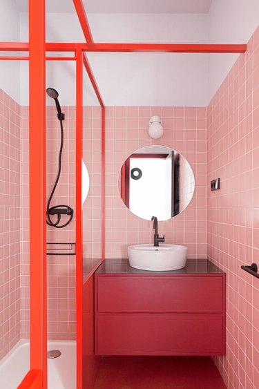 colors that go with red, blush tile bathroom with red accents